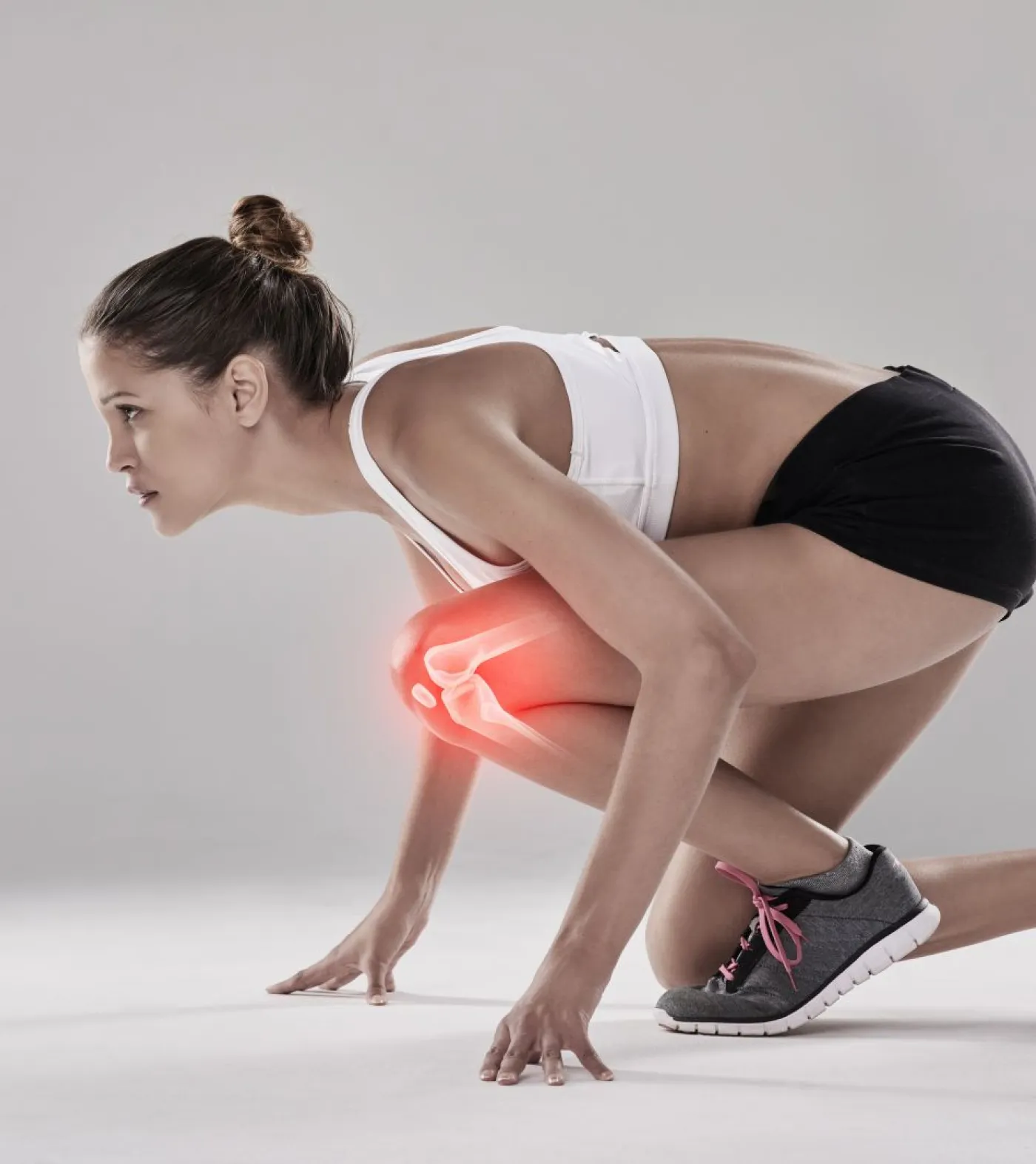 Frau mit schmerzendem Knie